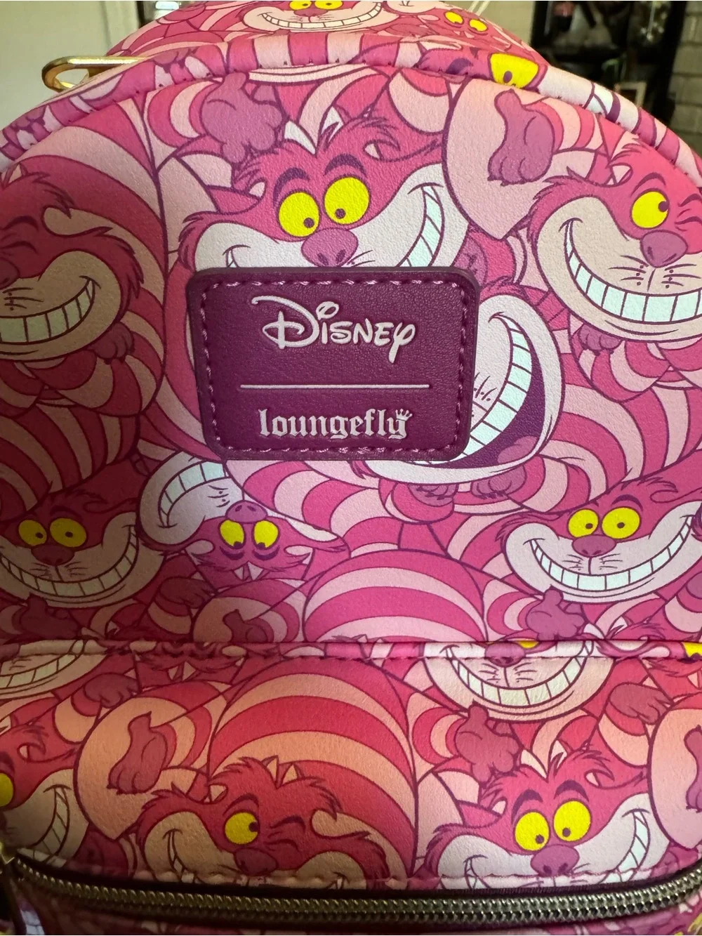 Loungefly Disney Cheshire Cat Pink Mini Backpack with Yellow Accents